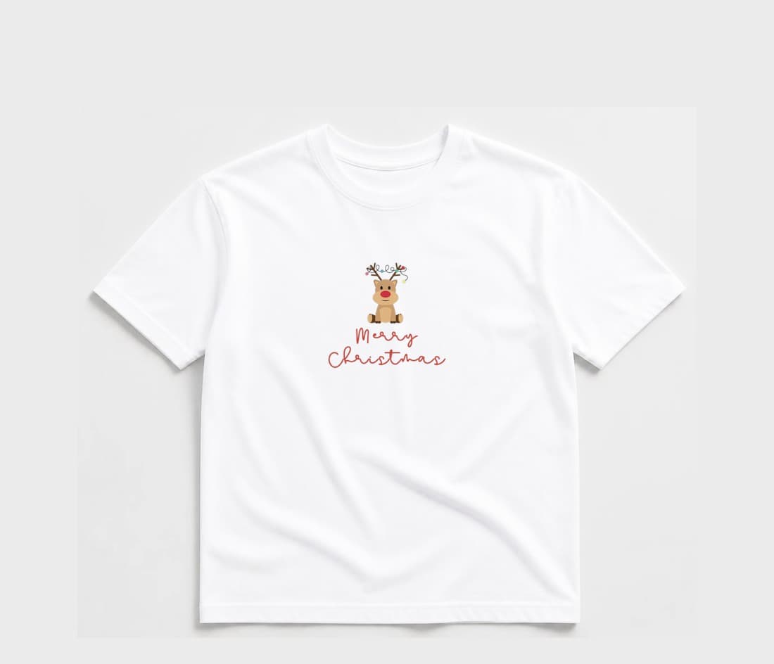 White youth t-shirt flat-lay with the original cartoon reindeer with a red nose and Christmas lights on his antlers above "Merry Christmas" in red script